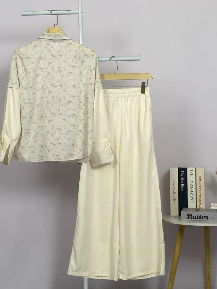 CHICMORE Kaos palsu dua potongan desain cetak bergabung warna murni dengan renda dan aksesoris bordir dengan celana panjang