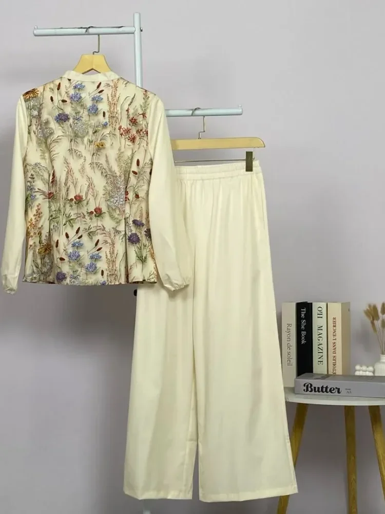 ASAYA Kemeja wanita dengan kombinasi pola bunga dan warna polos, gaya elegan dipadukan dengan celana panjang warna polos