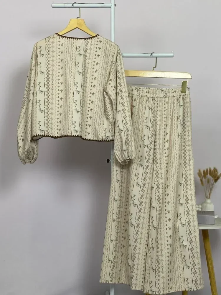 ASAYA Atasan lengan panjang bermotif dengan desain tepi bawah tidak teratur dan pita houndstooth dipadukan dengan celana panjang bermotif