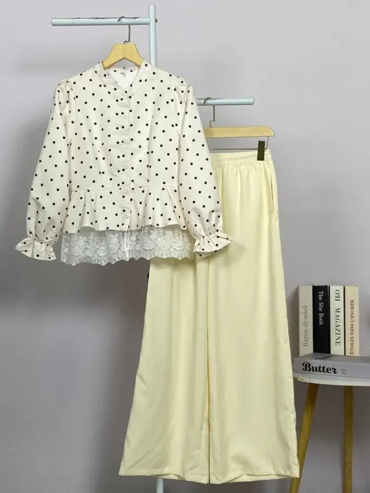 CHICMORE Polka lace shirt paired with solid colored pants