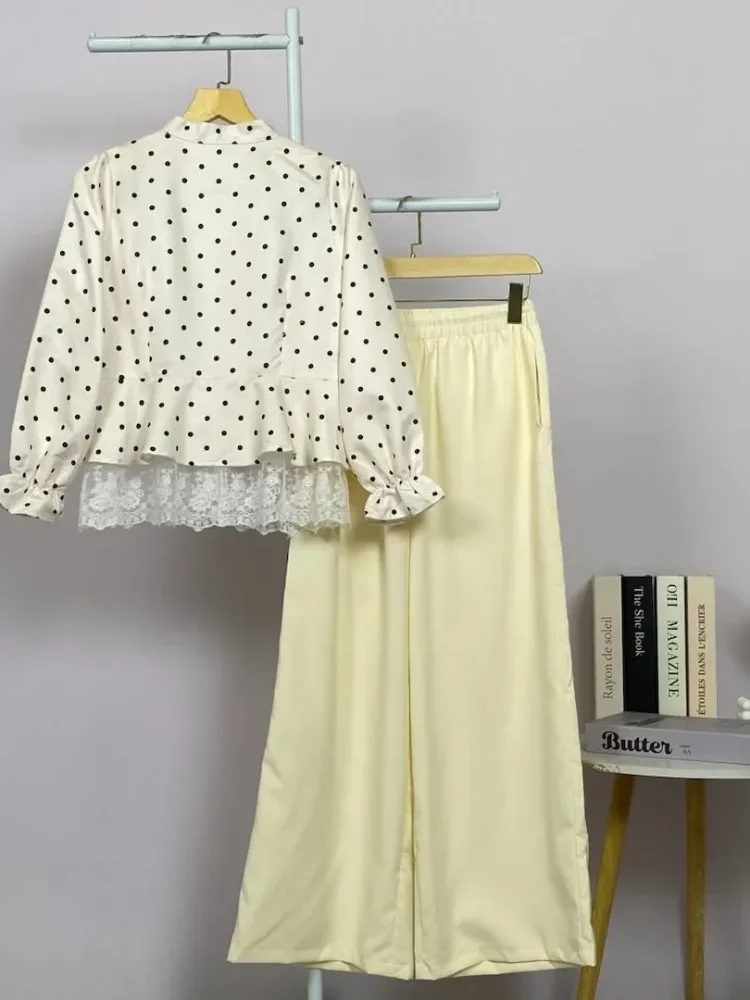 CHICMORE Polka lace shirt paired with solid colored pants