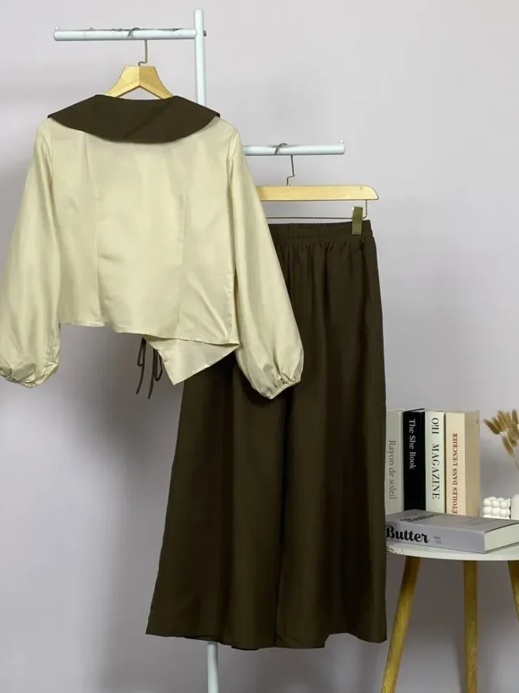 ASAYA Atasan lengan panjang gaya retro dengan desain tidak beraturan dan hiasan tali, dipadukan dengan celana panjang polos