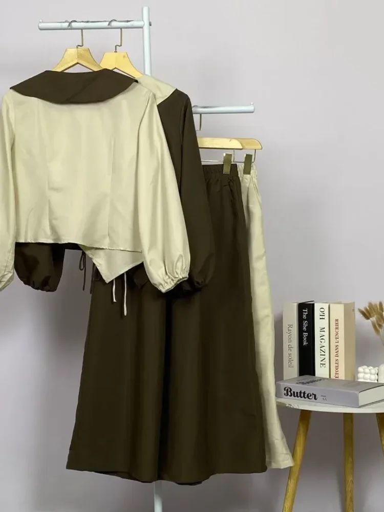 ASAYA Atasan lengan panjang gaya retro dengan desain tidak beraturan dan hiasan tali, dipadukan dengan celana panjang polos