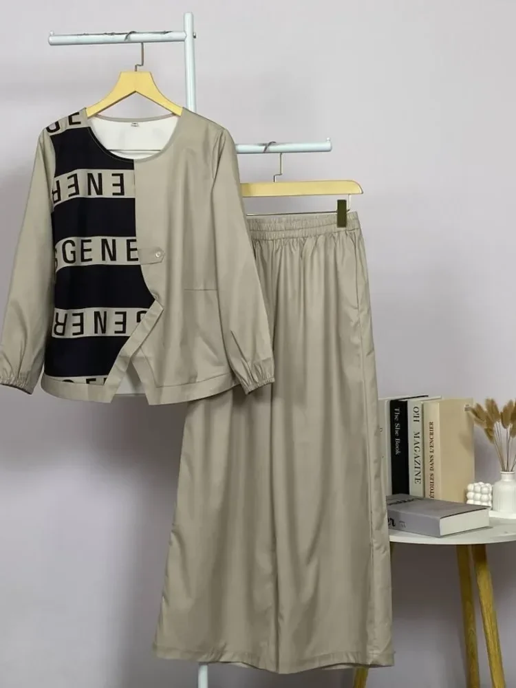 ASAYA Atasan lengan panjang wanita dengan desain tak beraturan dan motif yang sedang tren dipadukan dengan celana polos