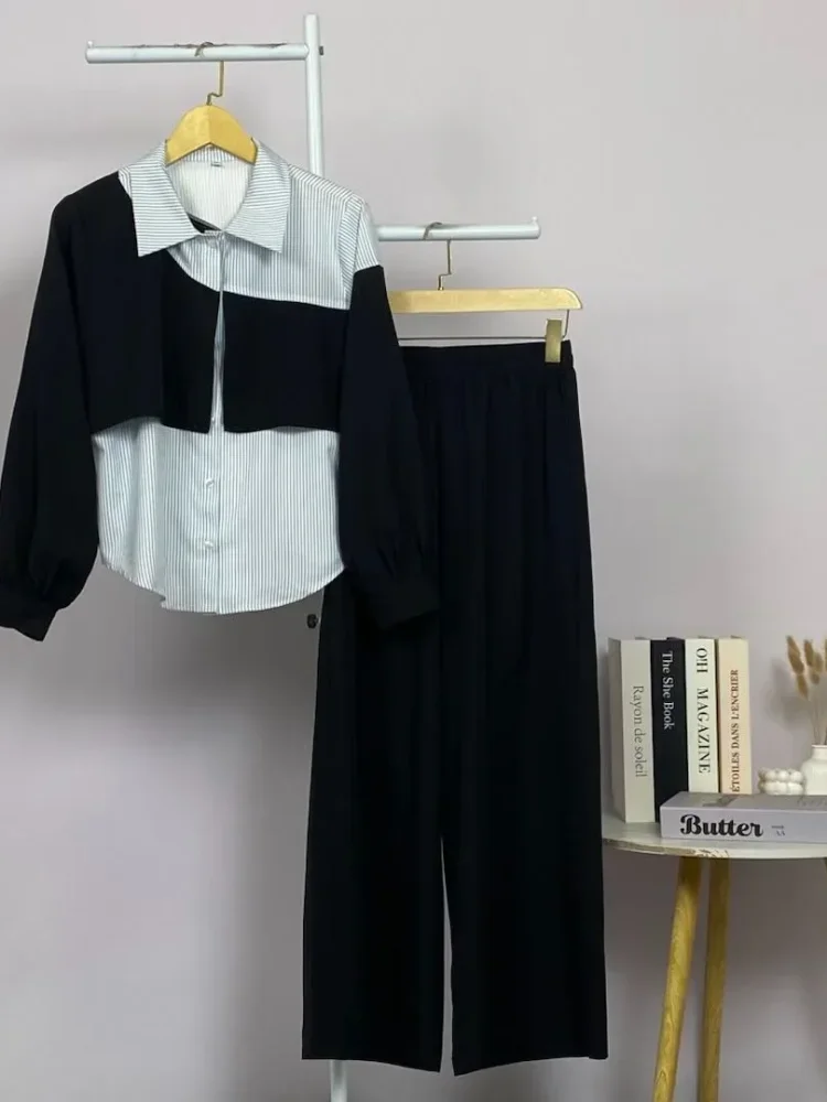 ASAYA Atasan dua potong bergaya minimalis yang cocok untuk bekerja, dipadukan dengan celana yang nyaman.