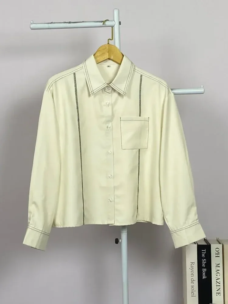 ASAYA Atasan lengan panjang polos dengan kerah polo, dilengkapi saku dan desain jahitan sambungan