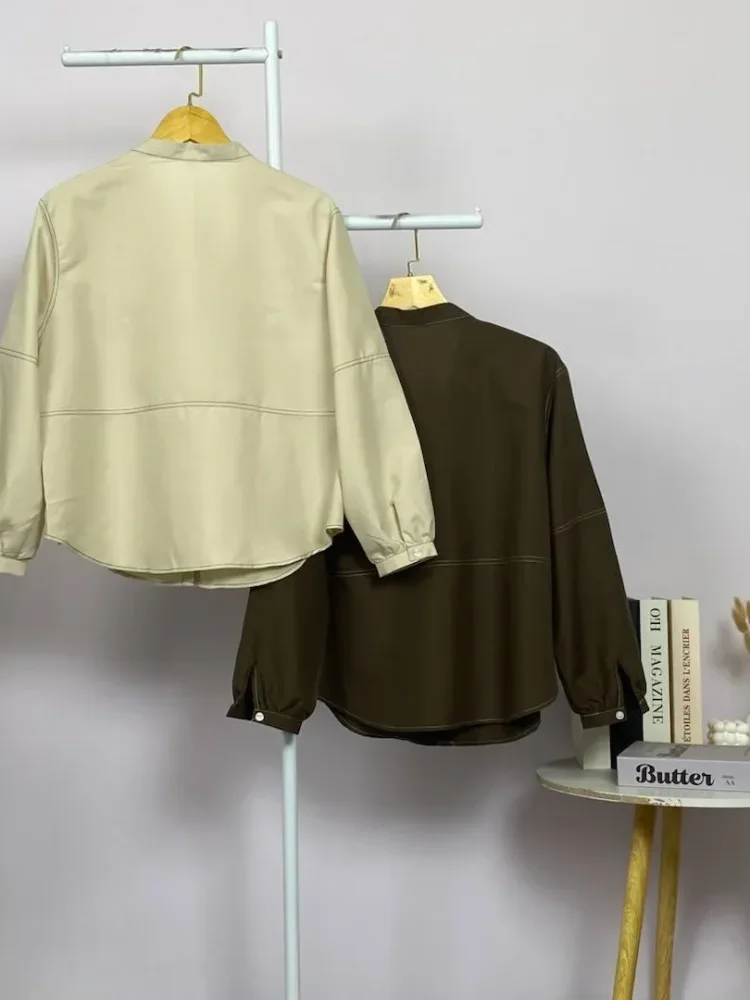 ASAYA Kemeja atasan kasual terbaru dengan desain garis tabrak, warna polos, kerah bulat, dan kancing satu baris
