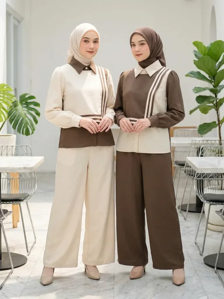 ASAYA Atasan lengan panjang memiliki efek lapisan ganda, dipadukan dengan rompi warna kontras dan celana panjang warna sama, dilapisi lagi dengan celana panjang set dua potong