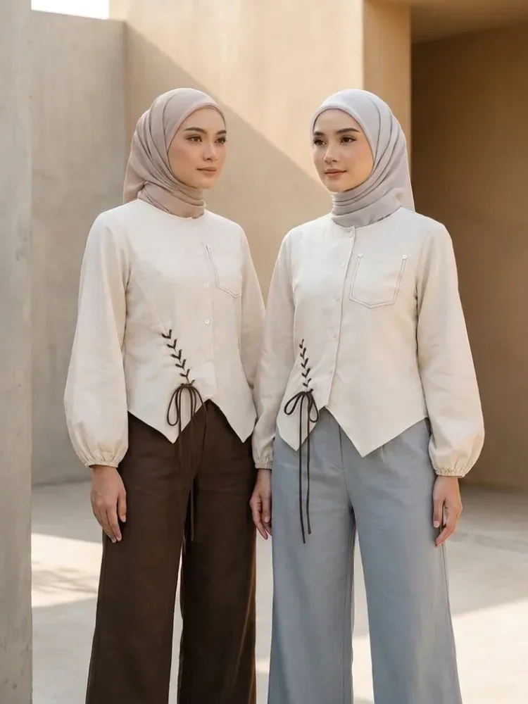 ASAYA Atasan lengan panjang dengan desain tidak beraturan, hiasan tali, dan jahitan bentuk kantong palsu, dipadukan dengan set celana panjang polos