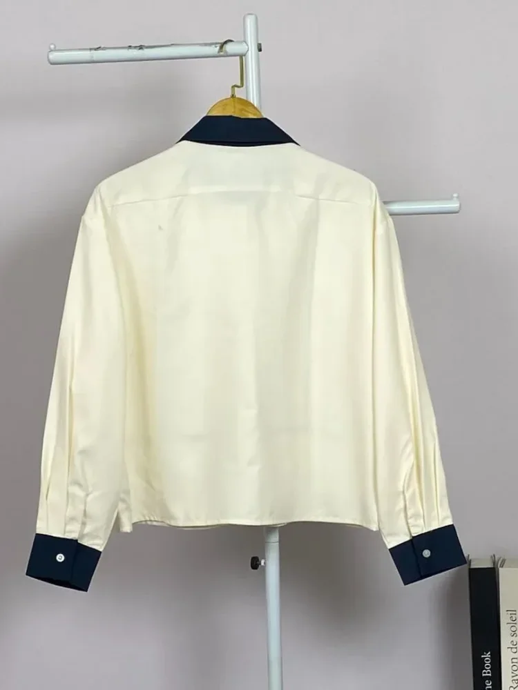 ASAYA Atasan lengan panjang polos dengan kerah polo, dilengkapi saku dan desain jahitan sambungan
