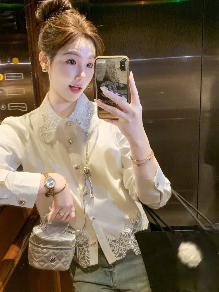 FADFAD Atasan wanita elegan aksen cut-out kerah pater pan minimalis