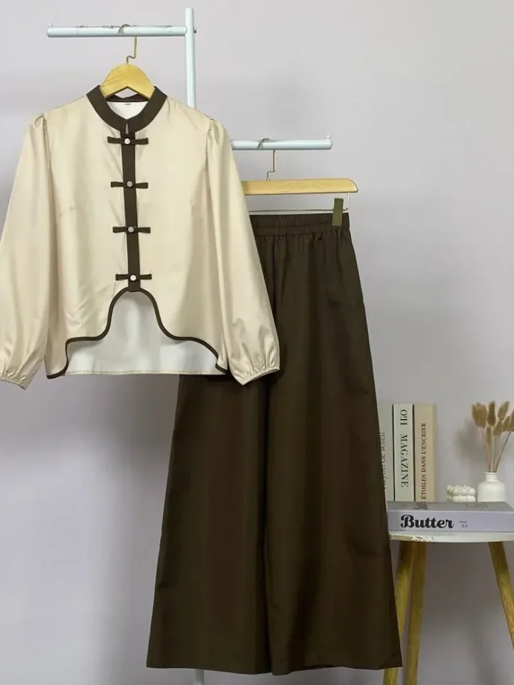 ASAYA Kemeja lengan panjang wanita dengan warna polos dan bawah yang tidak beraturan, dipadukan dengan desain tali kontras dan kancing tangan, kerah warna kontras dipadukan dengan celana panjang polos