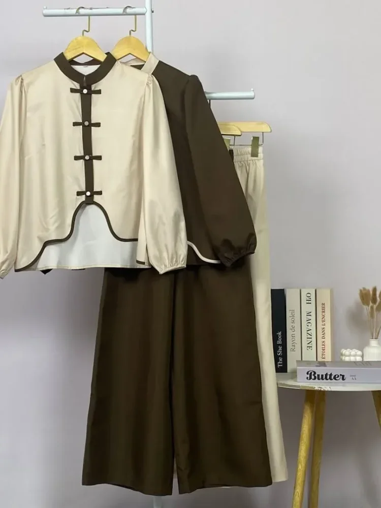ASAYA Kemeja lengan panjang wanita dengan warna polos dan bawah yang tidak beraturan, dipadukan dengan desain tali kontras dan kancing tangan, kerah warna kontras dipadukan dengan celana panjang polos