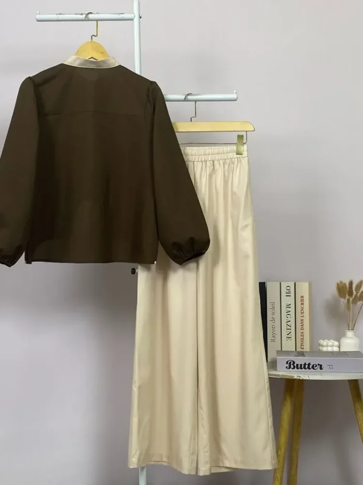 ASAYA Kemeja lengan panjang wanita dengan warna polos dan bawah yang tidak beraturan, dipadukan dengan desain tali kontras dan kancing tangan, kerah warna kontras dipadukan dengan celana panjang polos