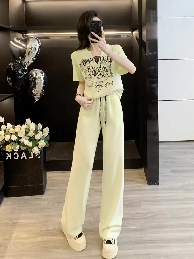 FADFAD Setelan gaya elegan polos lengan pendek dengan celana model kaki lurus untuk wanita