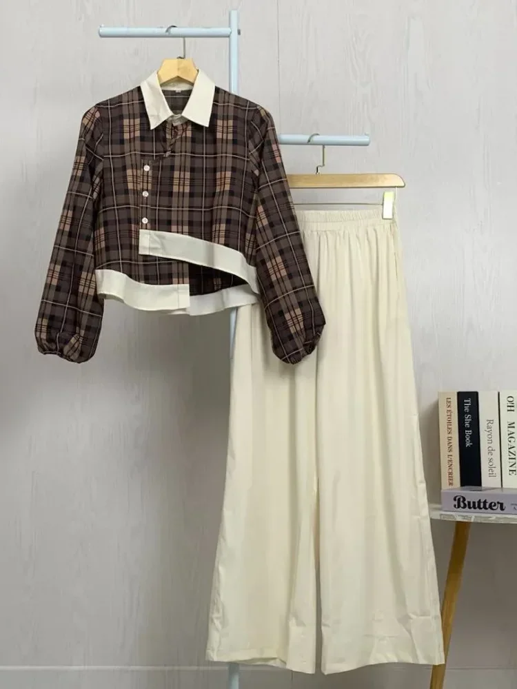 [NEW]ASAYA Setelan dua potong dengan kemeja lengan panjang bermodel unik dengan kerah dan hem tidak beraturan, dipadukan dengan celana lebar polos