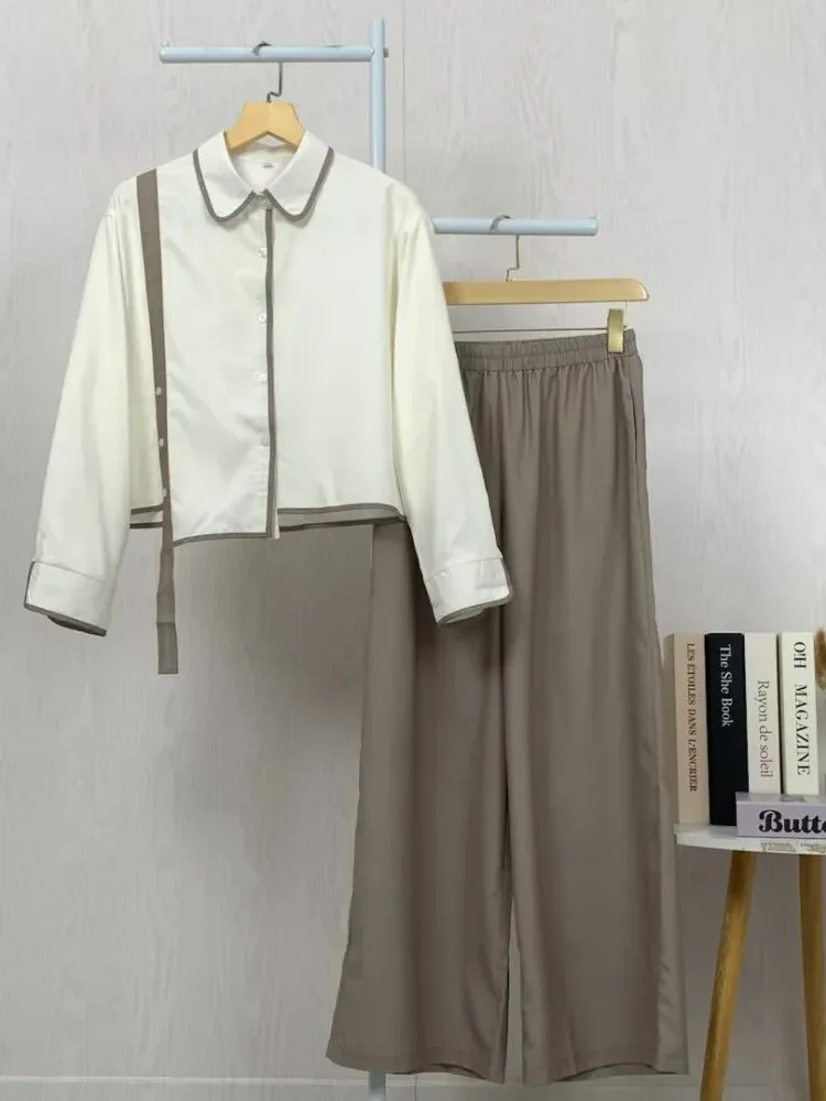 [NEW]ASAYA Setelan dua potong wanita dengan desain tidak beraturan dan kombinasi warna kontras, dipadukan dengan celana longgar dua potong