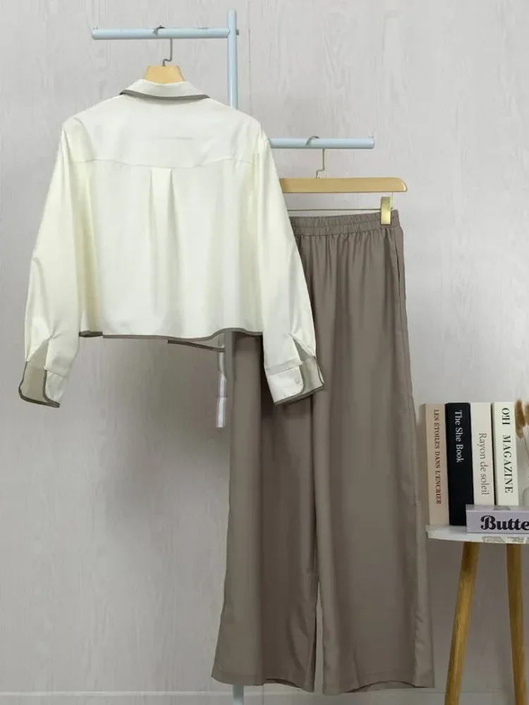 [NEW]ASAYA Setelan dua potong wanita dengan desain tidak beraturan dan kombinasi warna kontras, dipadukan dengan celana longgar dua potong