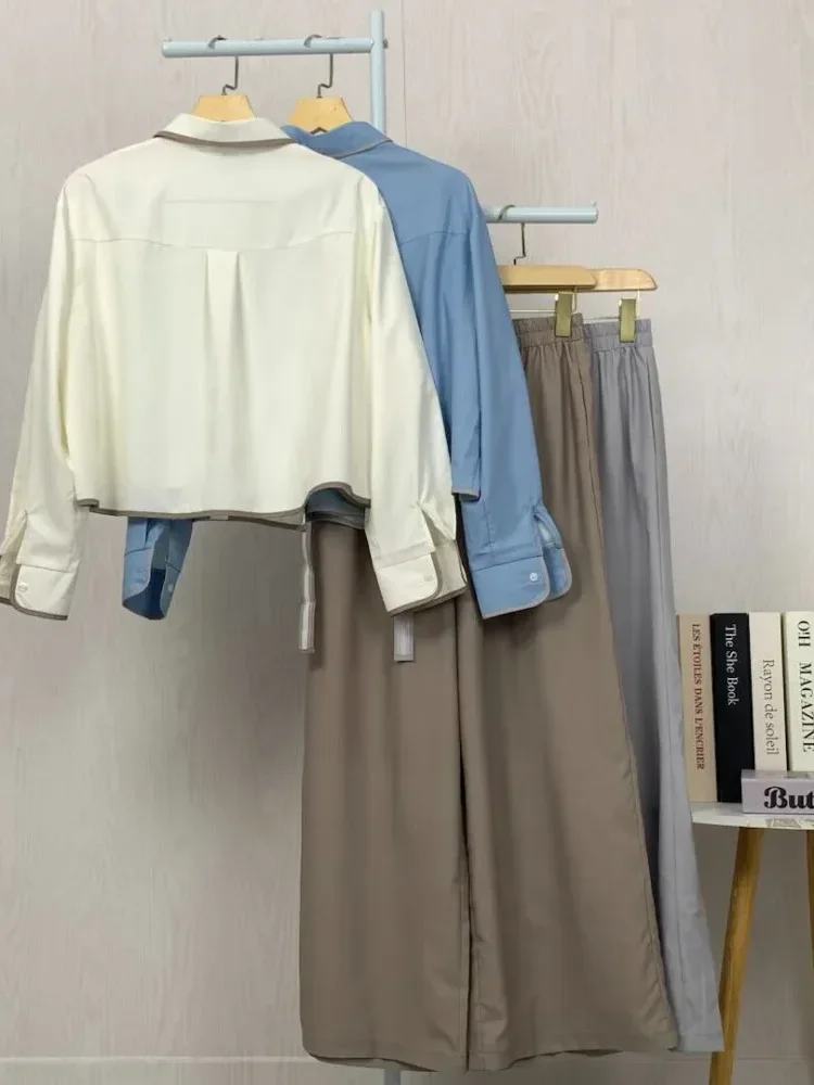 [NEW]ASAYA Setelan dua potong wanita dengan desain tidak beraturan dan kombinasi warna kontras, dipadukan dengan celana longgar dua potong