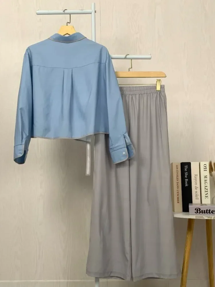 [NEW]ASAYA Setelan dua potong wanita dengan desain tidak beraturan dan kombinasi warna kontras, dipadukan dengan celana longgar dua potong