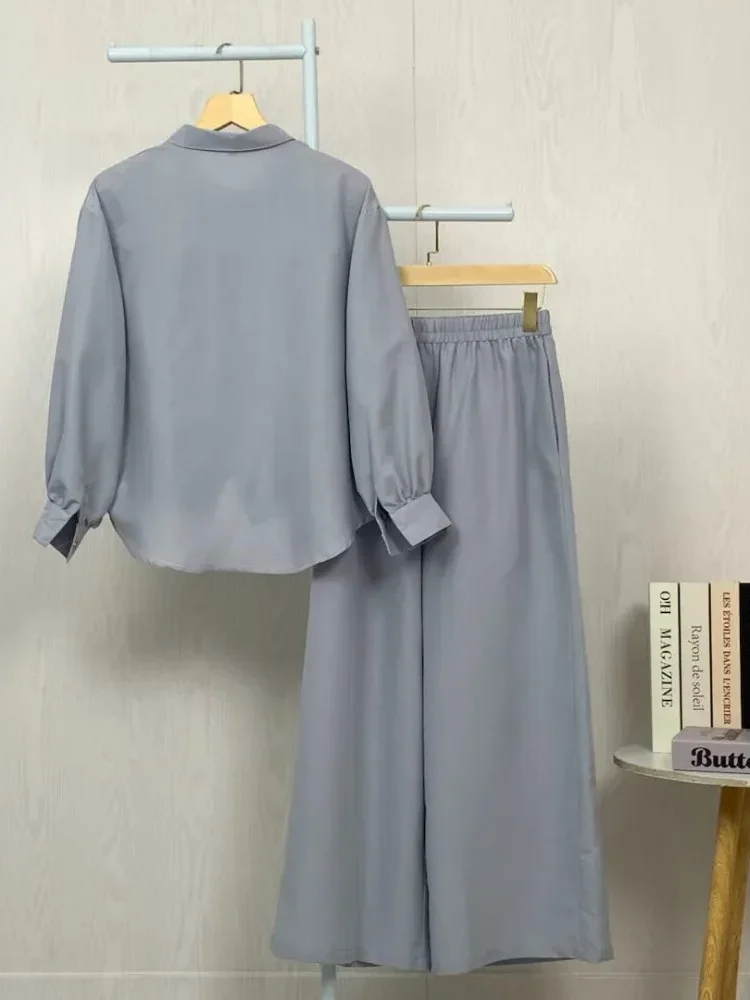 ASAYA Setelan dua potong atasan dan celana longgar aneka warna yang stylish.