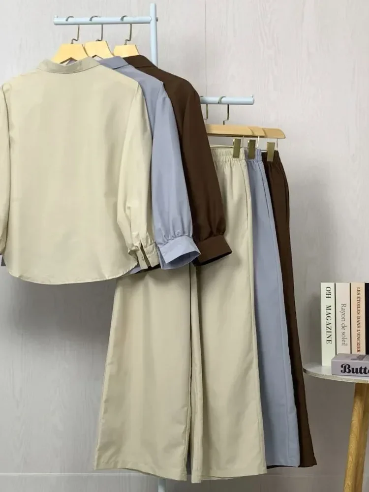 ASAYA Setelan dua potong atasan dan celana longgar aneka warna yang stylish.