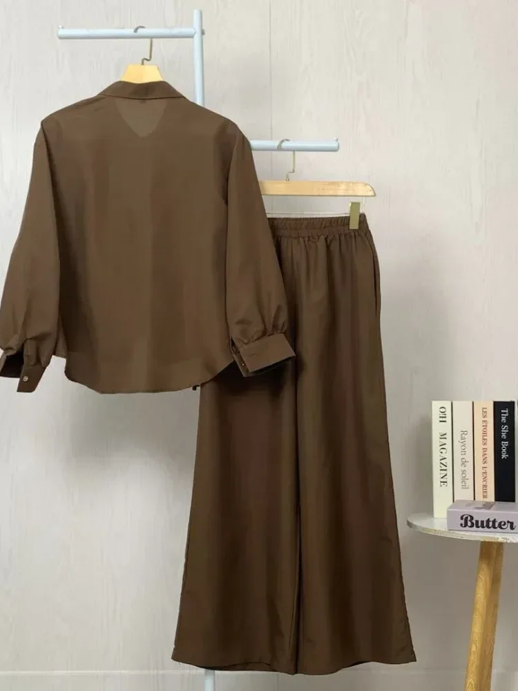 ASAYA Setelan dua potong atasan dan celana longgar aneka warna yang stylish.