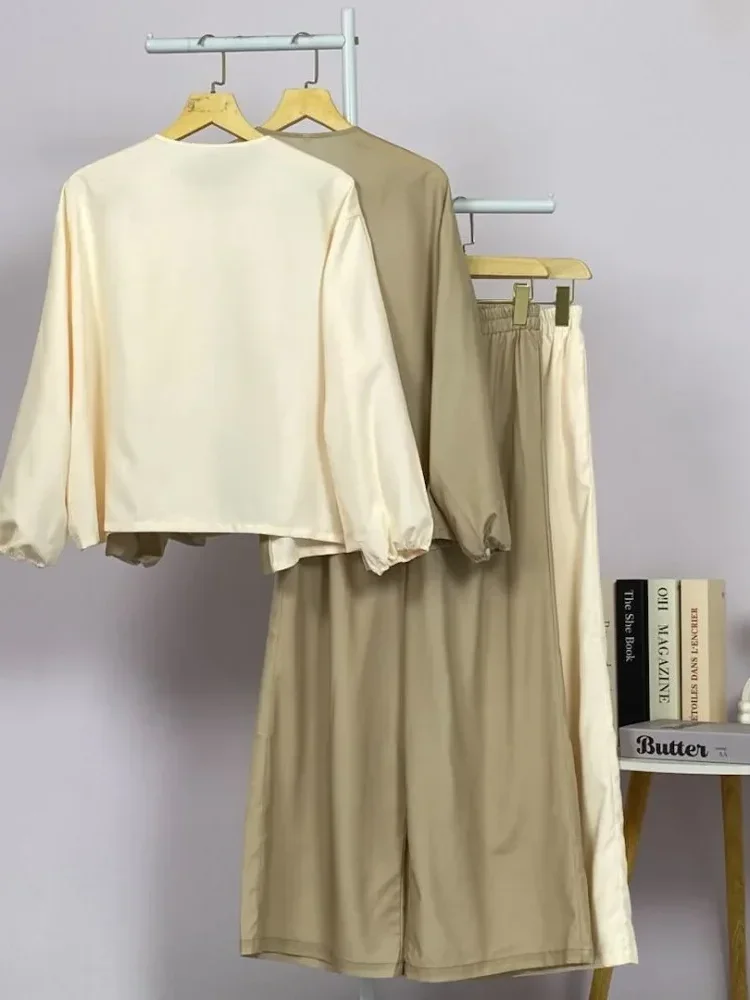 [DISKON KILAT]ASAYA Atasan wanita lengan panjang longgar dengan desain tidak teratur, kerah bulat, warna polos dengan kombinasi warna, dipadukan dengan celana kaki lebar