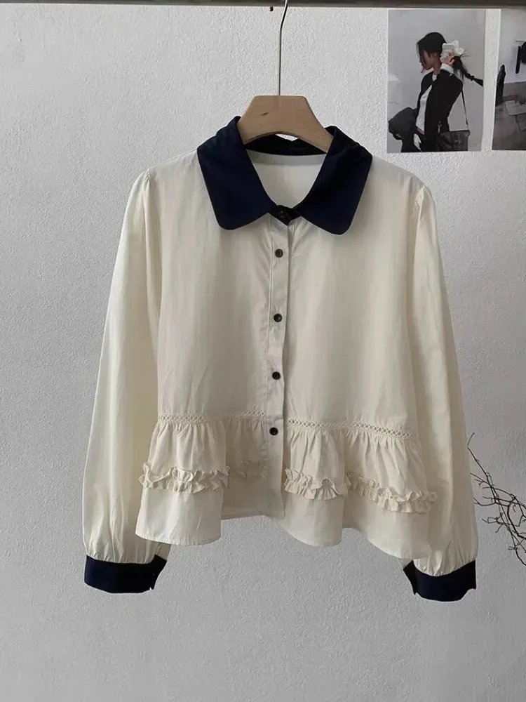 [DISKON KILAT]CHICMORE Atasan kemeja kerah boneka dengan model unik dan kancing aktif sebaris bergaya trendi