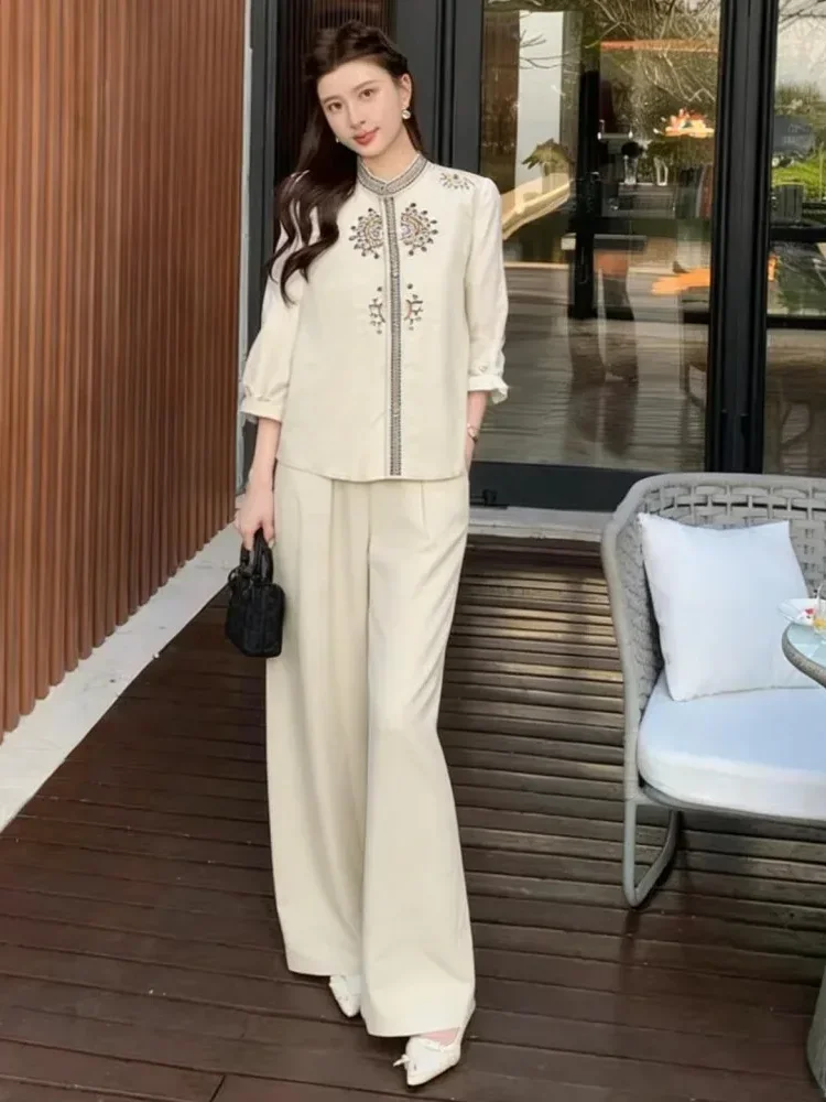 FADFAD Setelan dua potong atasan dan celana longgar dengan bordir.