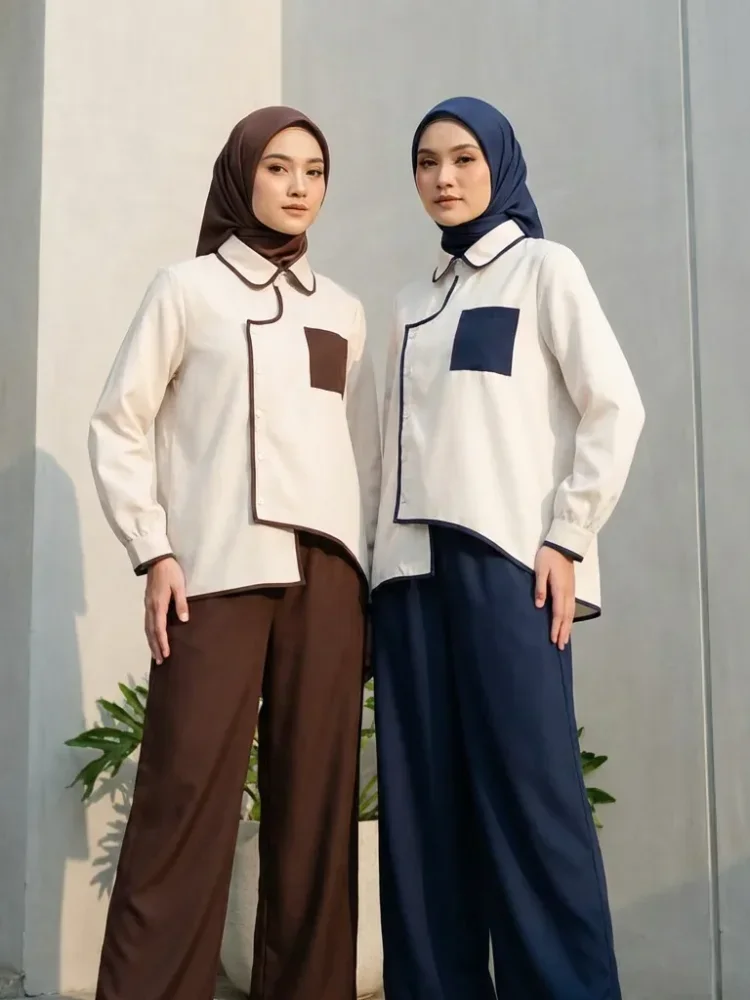 ASAYA Atasan lengan panjang warna kontras dengan kantong dan desain tepi tidak beraturan dipadukan dengan celana panjang longgar berwarna polos