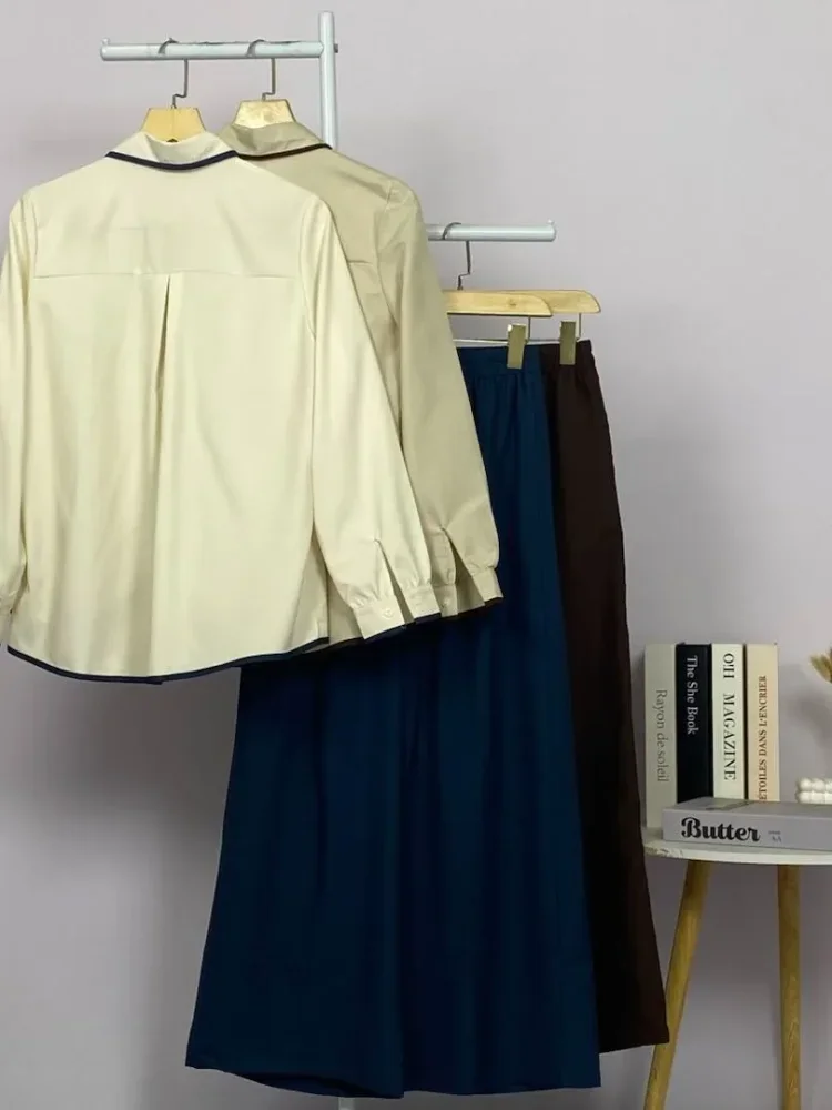 ASAYA Atasan lengan panjang warna kontras dengan kantong dan desain tepi tidak beraturan dipadukan dengan celana panjang longgar berwarna polos